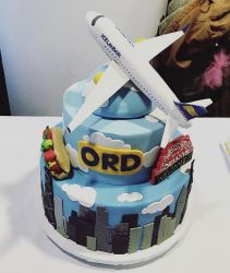 Cool Airplane Topper for 3 Tier Cake with IcelandAir & Chicago O'Hare Airport Theme.JPG