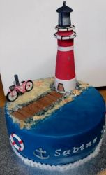 Lighthouse Cake with Pink Bike on Beach Nautical Theme Cake.JPG