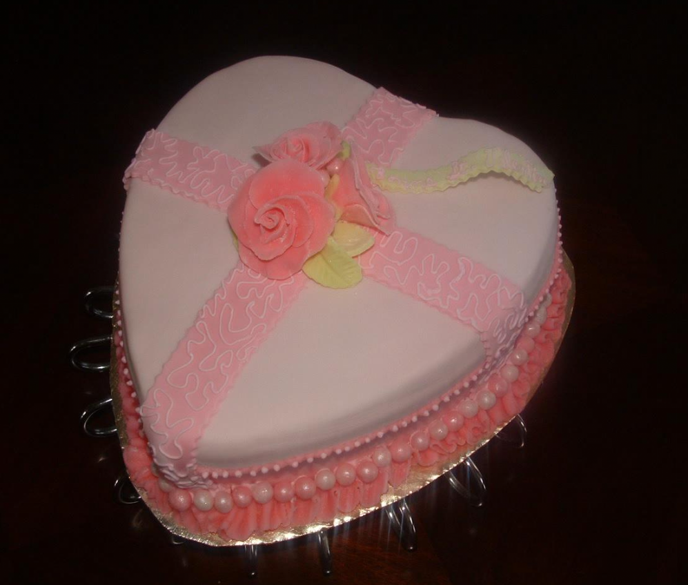 Christian valentine cake in peach pink in heart shape.PNG