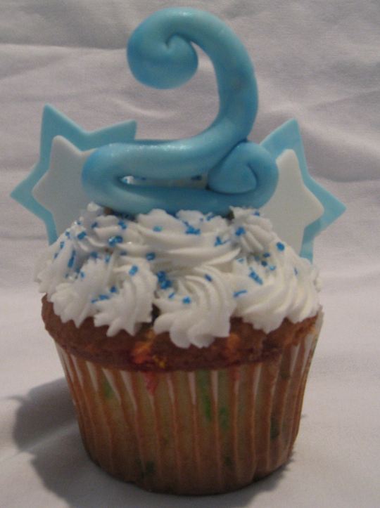 Cupcake with number 2 topper and butter cream.JPG
