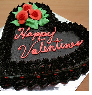 Black unique valentine cake with red floral decor.PNG