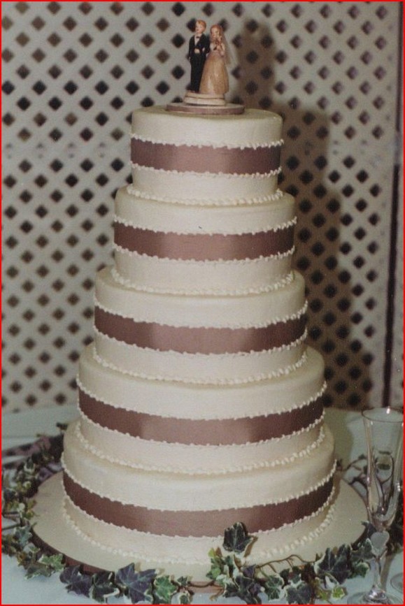 Butter cream chocolate wedding cake with ribbons.jpg