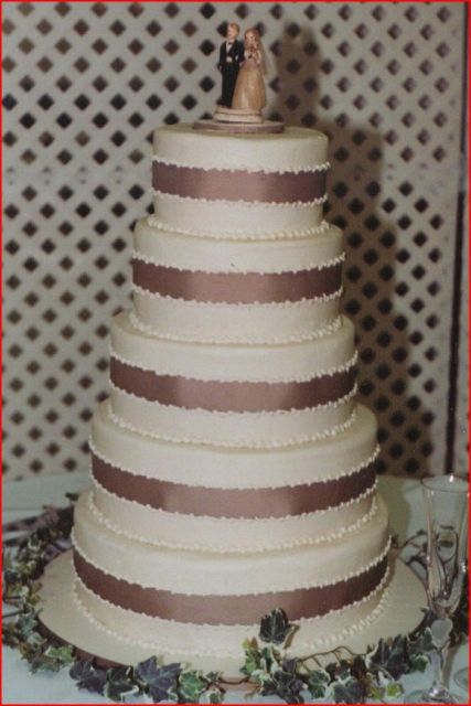 Butter cream chocolate wedding cake with ribbons.jpg