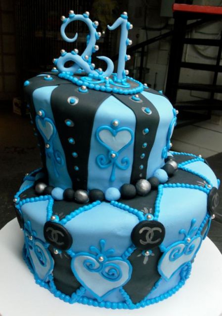 Blue and black 2 tier topsy turvy 21st birthday cake.JPG