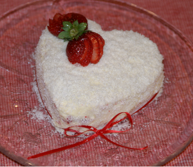 Heart shape valentine cake with coconut flakes.PNG