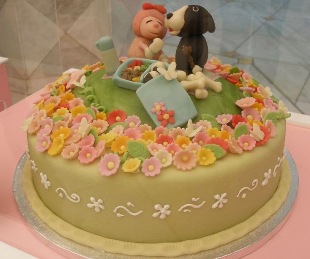 Green Valentines Cake with animals on a picnic in a flower field.JPG
