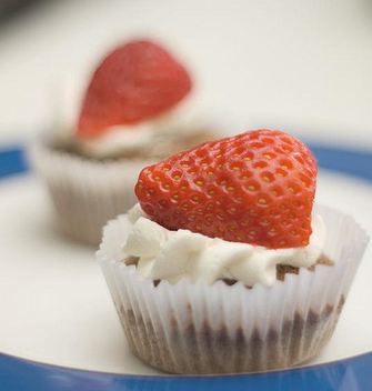 Strawberry topped cupcakes with cream and chocolate.JPG
