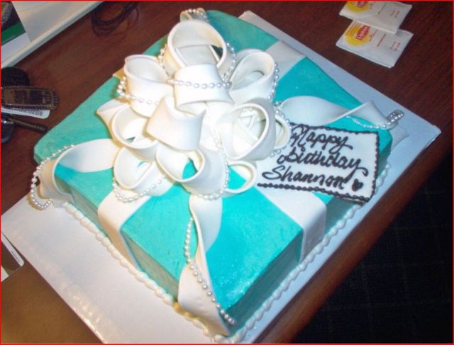 Giftbox birthday cake with fancy white ribbon.jpg