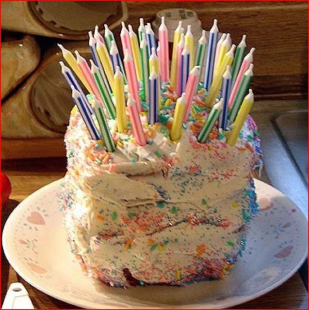 Birthday cake with many many candles.jpg