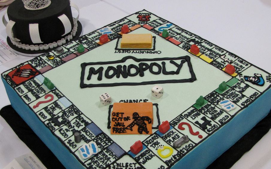 Monopoly theme cake with Get out of Jail Free card.JPG