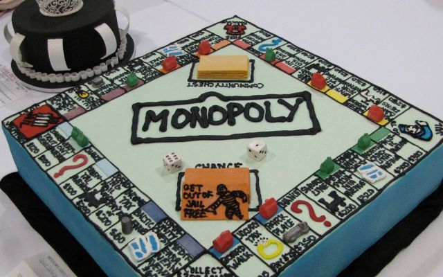 Monopoly theme cake with Get out of Jail Free card.JPG