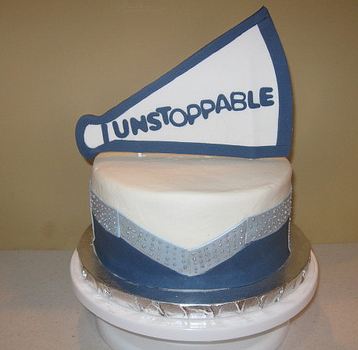 Blue and white cheerleading theme cake.JPG