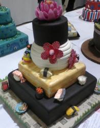 Four tier sushi theme cake.JPG
