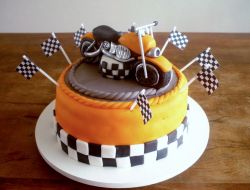 Motorcycle bike racing theme orange & chocolate cake.JPG