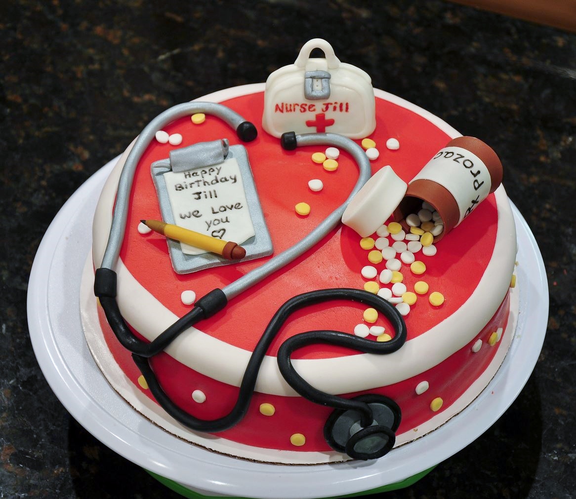 Birthday cake for Nurse in red Hospital theme.JPG