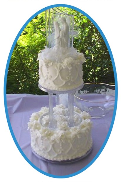 floral wedding cake in white with cake top