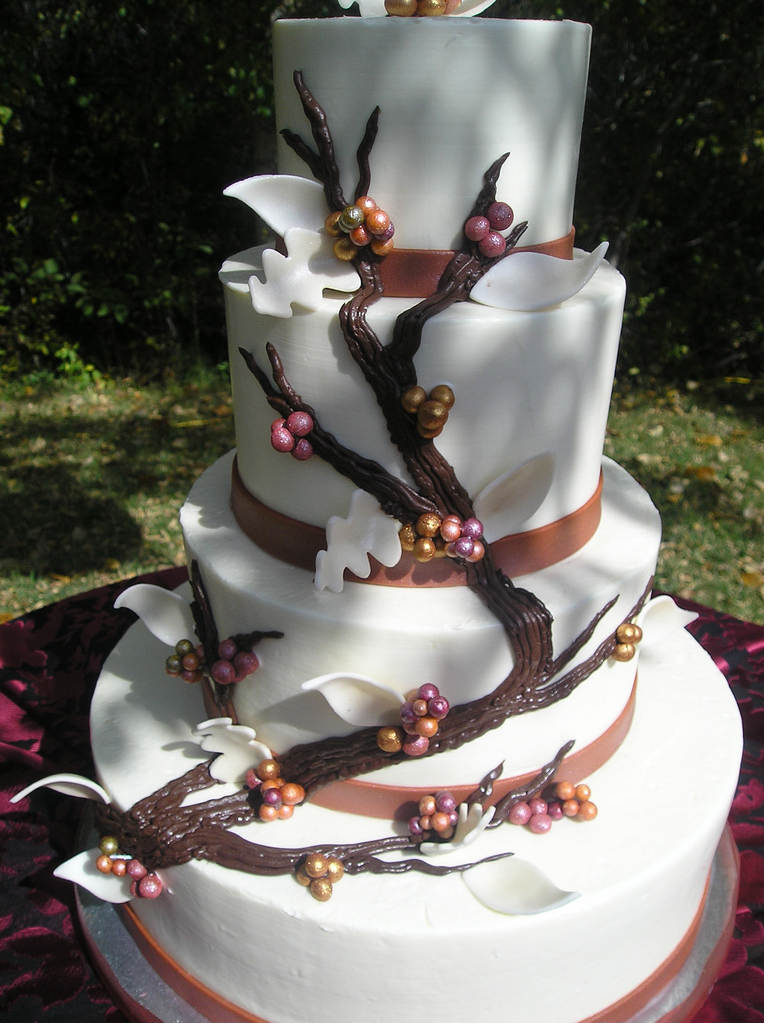Very chic wedding cake with bloom tree theme.PNG