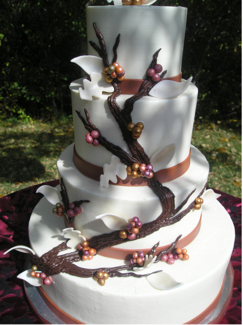 Very chic wedding cake with bloom tree theme.PNG