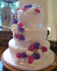 Wedding cake with fake flowers decor.PNG