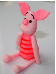 Piglet cake topper looking so cute.PNG