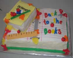 Notebook and dictionary cake with ruler and pencil.JPG