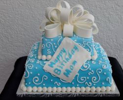 Blue 2 tier birthday cake large bow on top for Mom.JPG