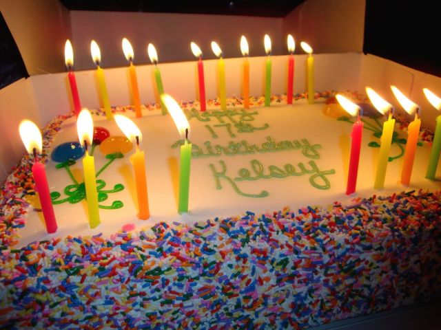 big fun birthday cake with alot of candles.jpg