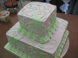 fancy birthday cake in purple and green.jpg