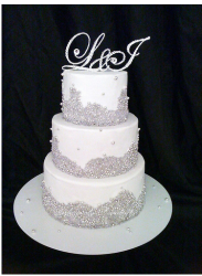 Crystal wedding cake with crystal toppers.PNG