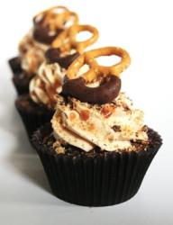Chocolate cream cupcakes with pretzel on top.JPG