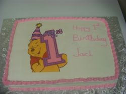 Winnie the Pooh First Birthday Cake.jpg