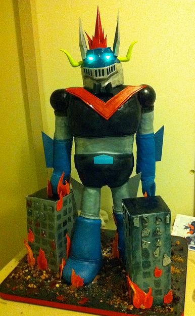 Giant robot next to burning buildings cake.JPG