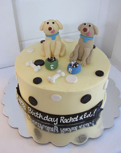 Two dogs with tongue out birthday cake.JPG