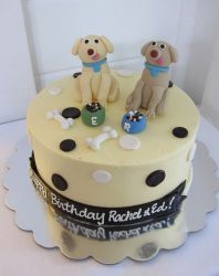Two dogs with tongue out birthday cake.JPG