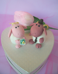cute sheep and ram wedding cake toppers with heart shape stand.PNG
