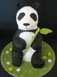 Panda with bamboo cake.JPG