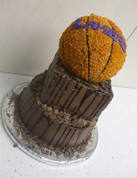 Three tier Los Angeles Lakers chocolate cake with basketball on top.JPG