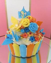 Cupcake cake with cake flowers for 21st birthday.JPG