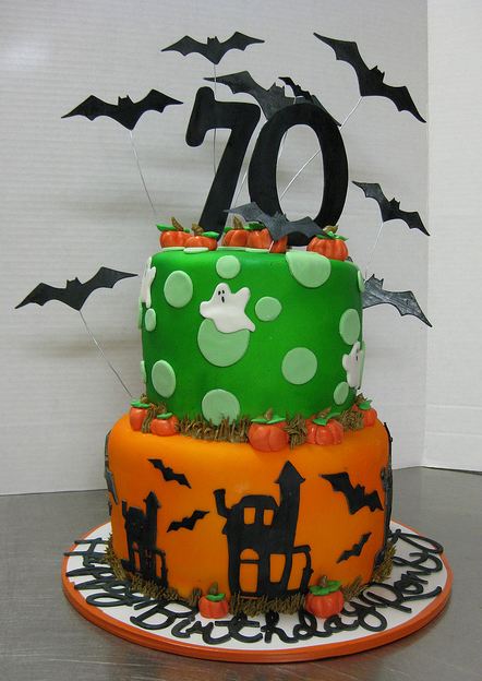Halloween theme 70th birthday cake in two tiers.JPG