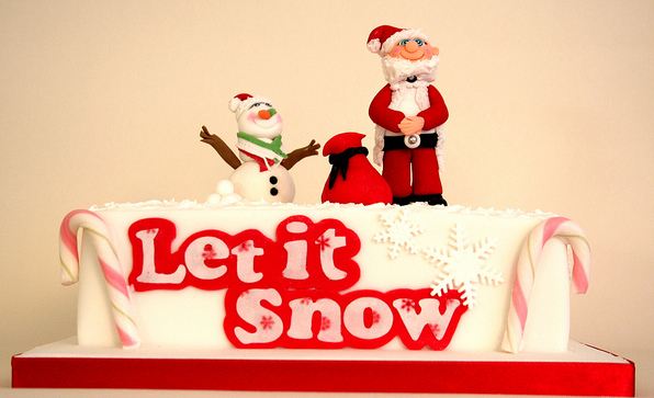 White Christmas cake with snowman and young Santa and Let it Snow.JPG