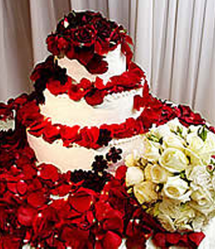 Denise Richards wedding cake with fresh roses.PNG