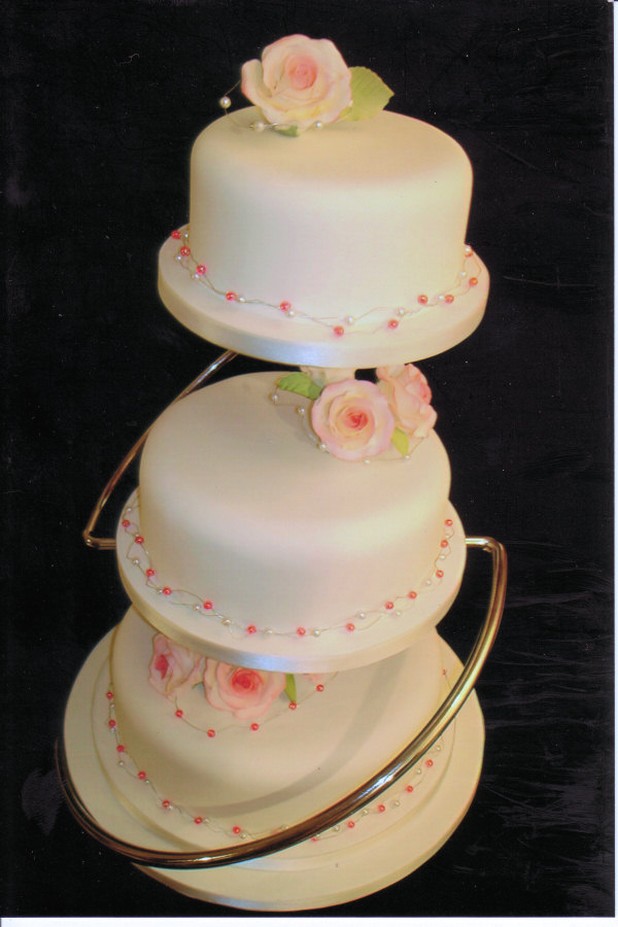 photo of wedding cake with roses