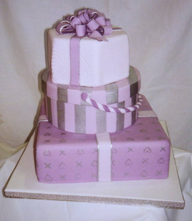 pink trendy wedding cake shaped in gift boxes