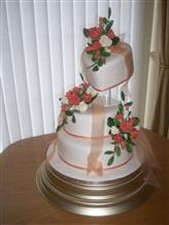heart shaped wedding cake with flowers