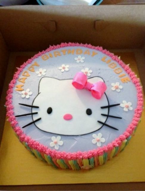 Hello Kitty birthday cake with pink bow.JPG