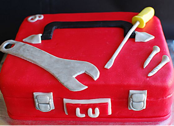 red tool box cake with wrench and screwdriver and screws.JPG