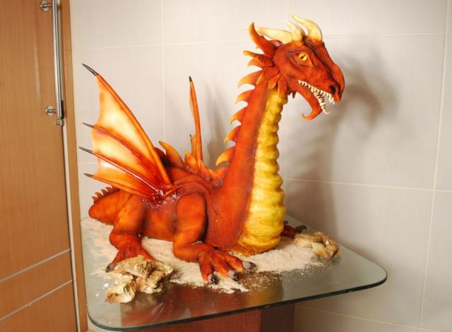 Orange sculpted dragon cake.JPG