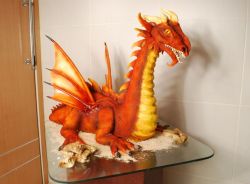 Orange sculpted dragon cake.JPG