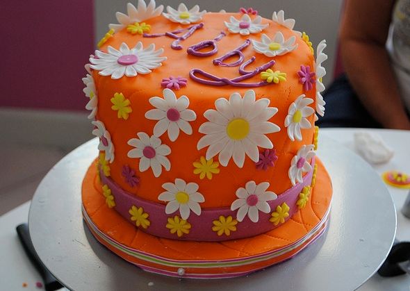 Orange cake with white flowers.JPG