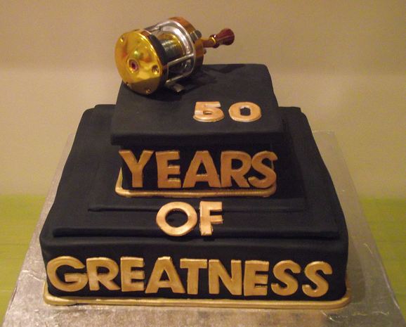 Two tier square chocolate birthday cake with gold lettering.JPG